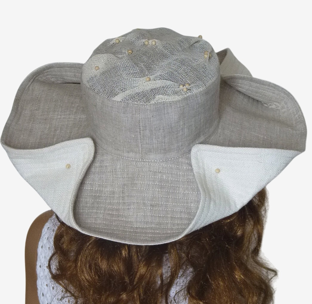 Back view of neutral beige women’s summer hat