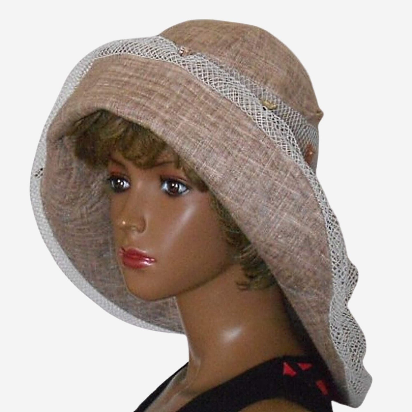 Beige hat with asymmetrical brim