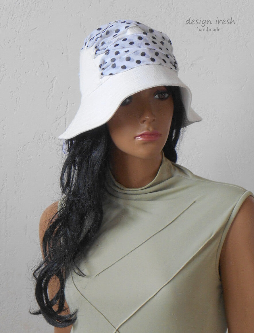 White cotton hat, black polka dots