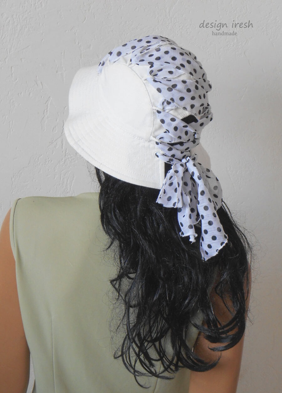 White cotton hat, black polka dots