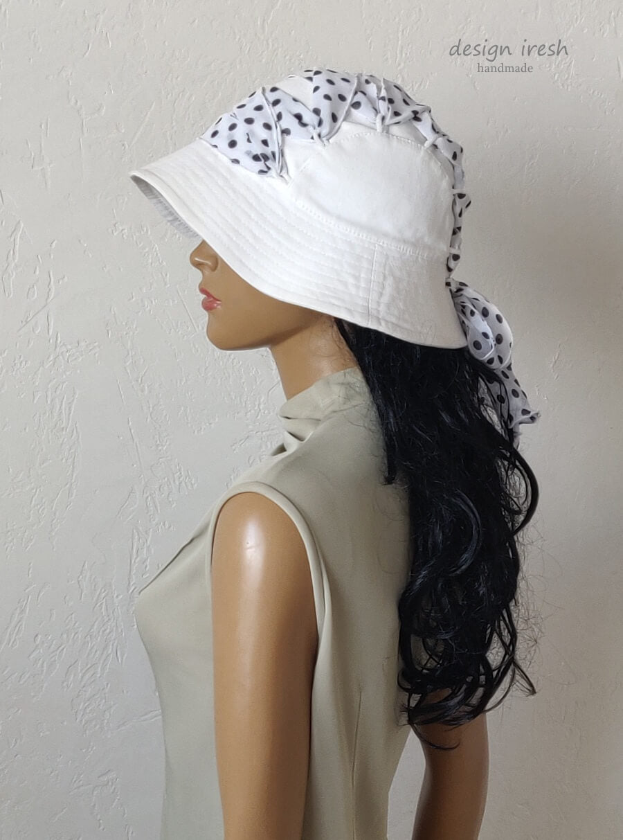 White cotton hat, black polka dots