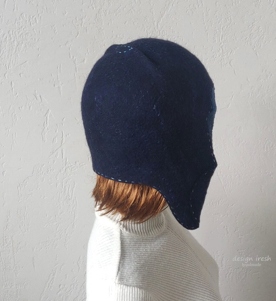 Dark blue felted trapper hat