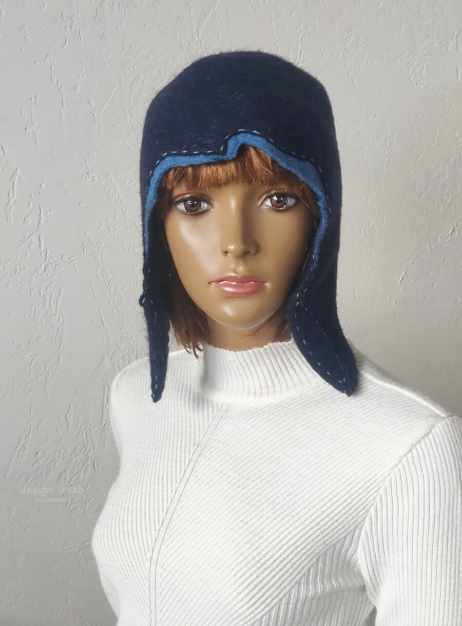 Dark blue felted trapper hat