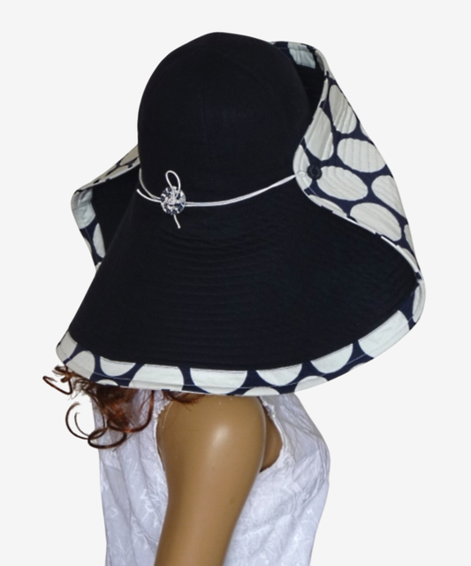 Dark blue wide brim beach hat with polka dots