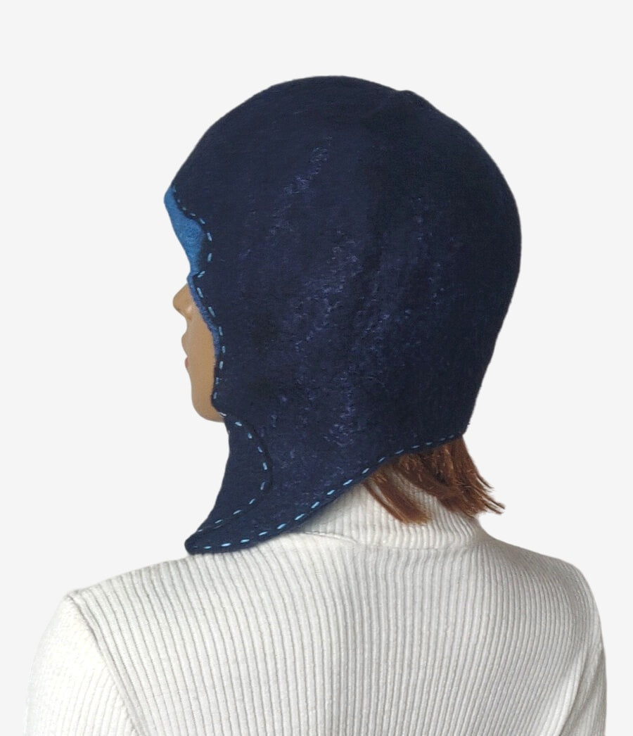 Winter hat with earflaps highlighting its shape and material, back view