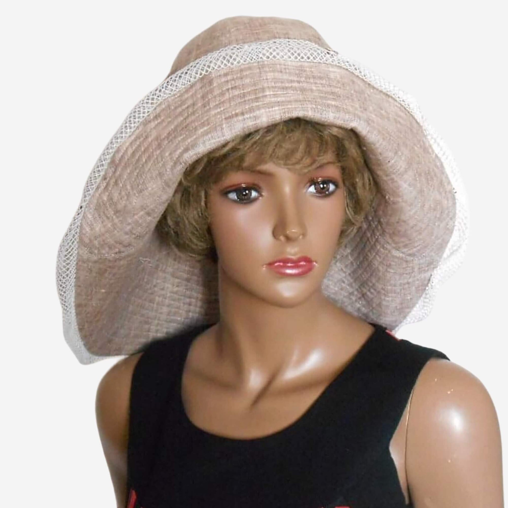 Beige linen sun hat for women, front view, wide asymmetrical brim with lace trim