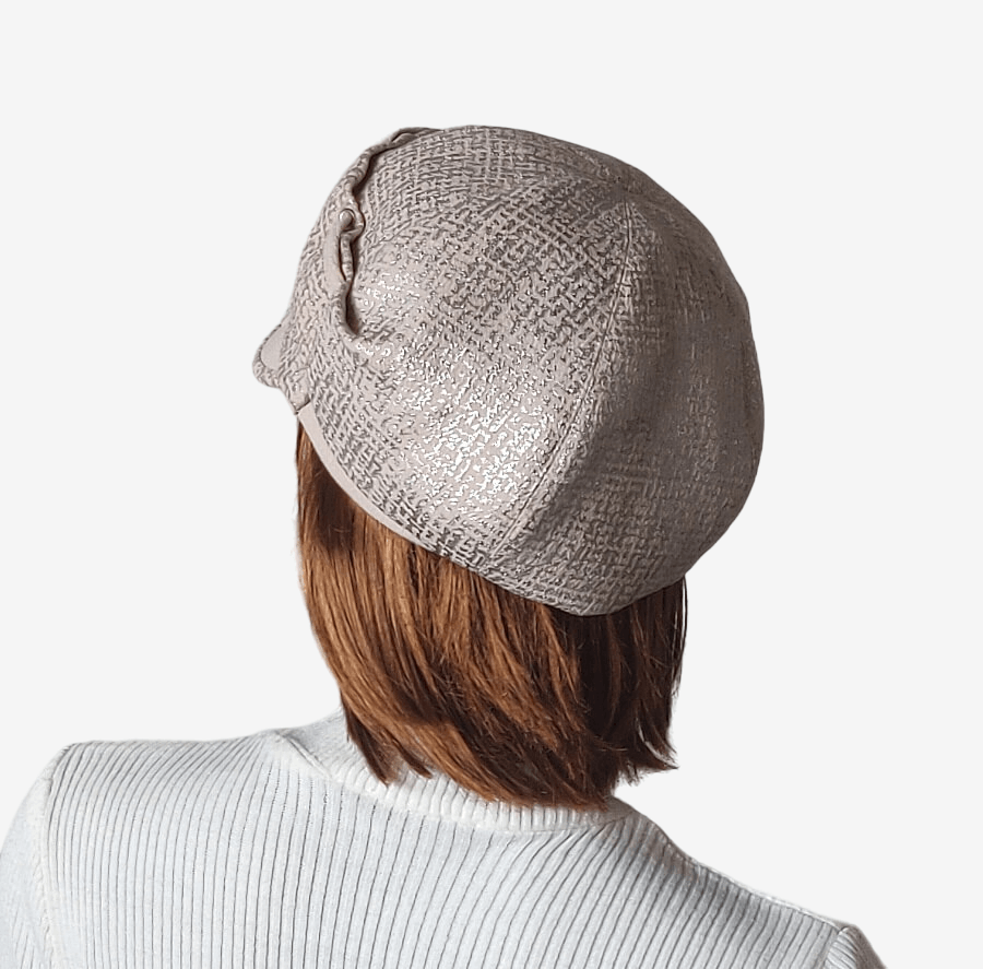 Back view of beige newsboy cap – warm lined hat for winter