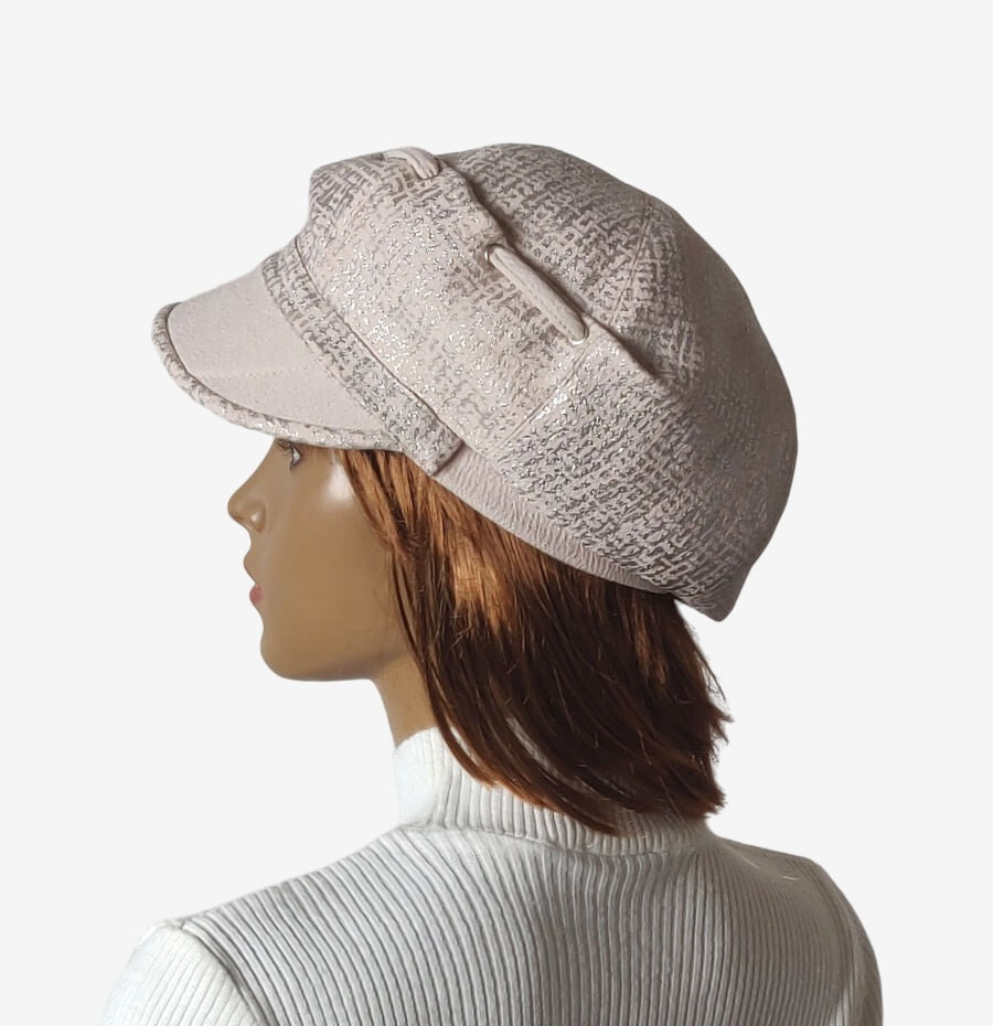 Beige newsboy cap, side view – stylish winter accessory for women