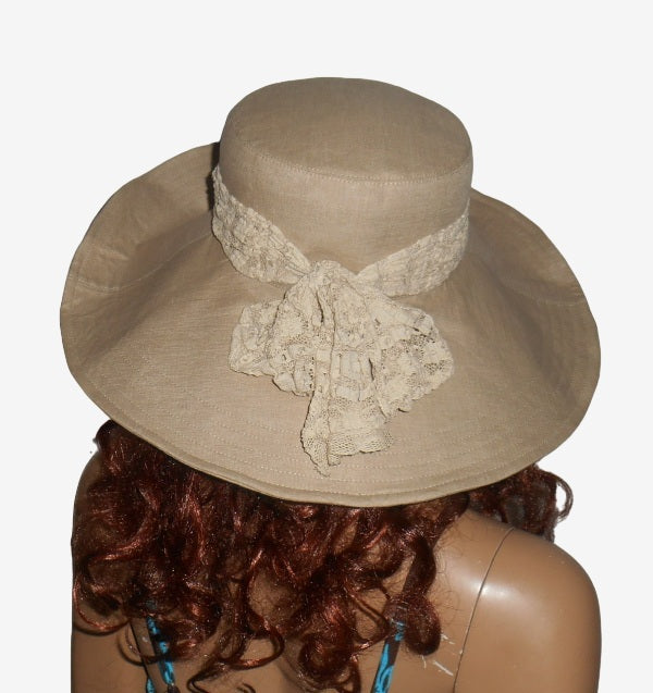 Beige wide-brimmed linen hat with a bow, back view