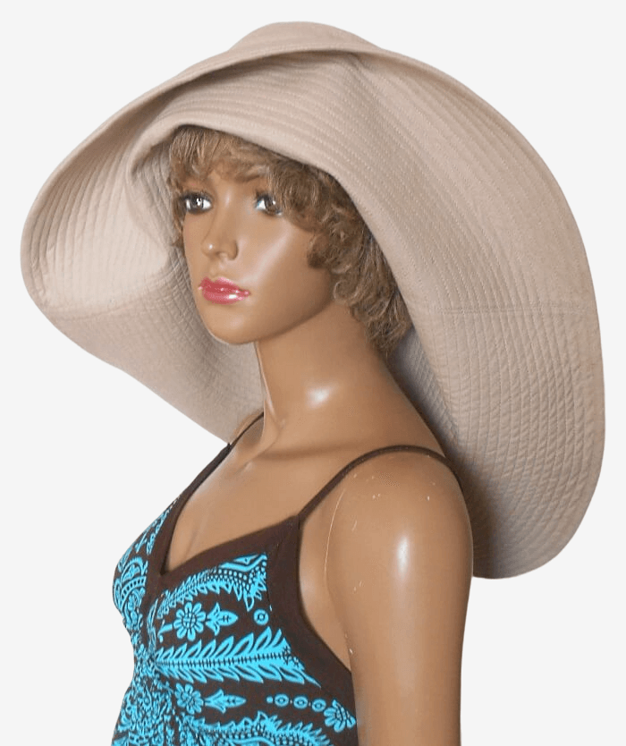 Beige wide brim sun hat, 3/4 angled view showing shape and brim
