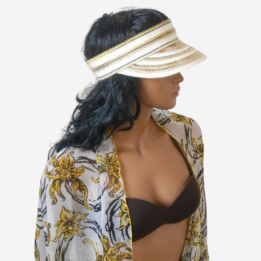 Woman wearing a floral cover-up and visor