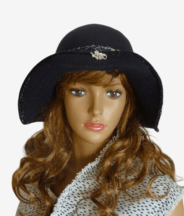 Black felted wool hat with medium brim and decorative brooch, front view