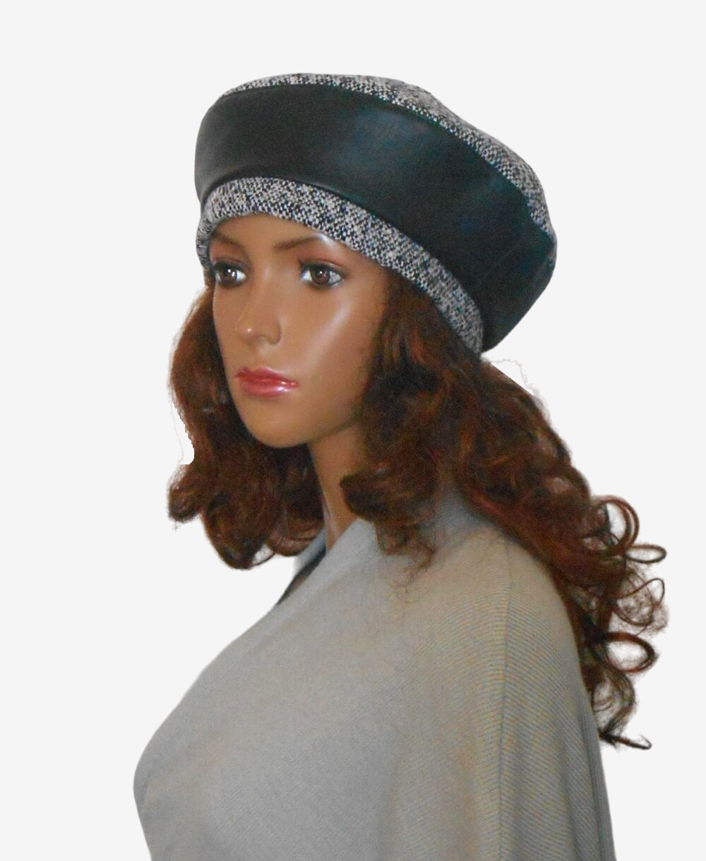 Black grey tweed leather beret, three quarters view