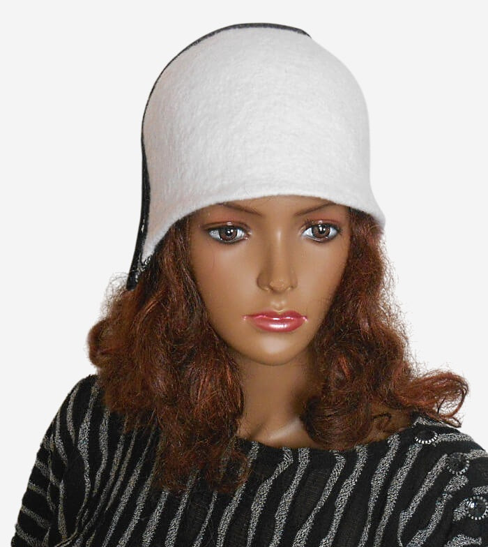 Front view of felted black & white women’s cloche hat