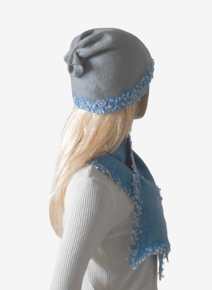 Back view of women’s light blue felted beanie and scarf set