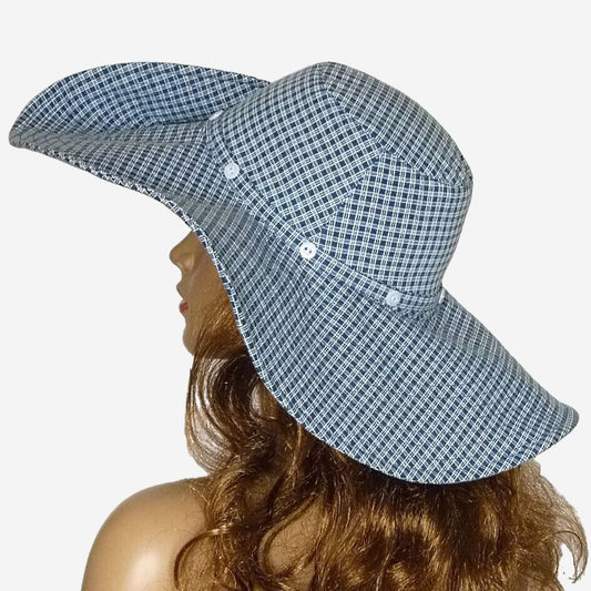 A blue and white checked wide-brimmed sun hat decorated with small buttons.