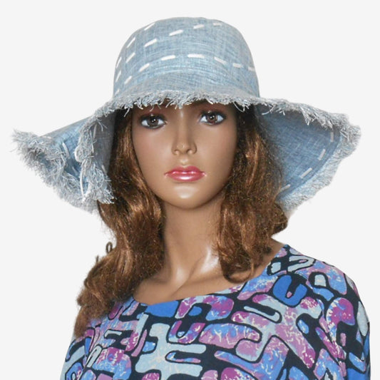 Blue wide-brimmed linen hat with deep side crease, cotton lining, stylish summer accessory