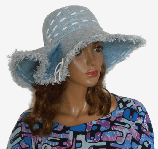 Three-quarter-view of blue wide-brim linen hat, soft cotton lining and breathable design