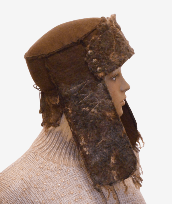Side view of brown felted trapper hat with ear flaps, handmade winter wool hat