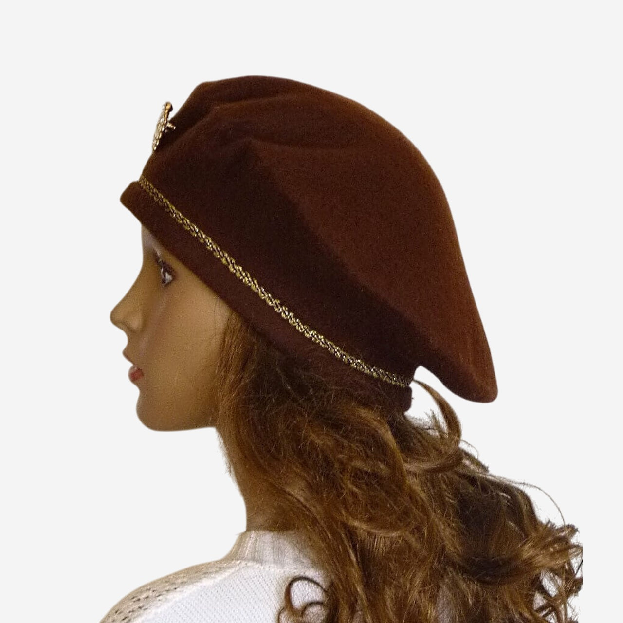 Side view of brown merino wool beret highlighting golden color braid accent