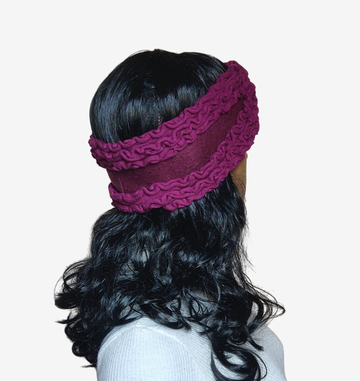 Warm burgundy wool headband perfect for winter outfits, three-quarter view