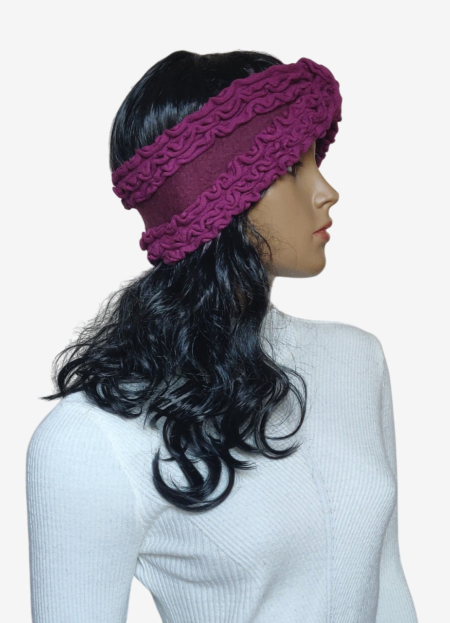 Handmade felted wool ear warmer in burgundy, side view with knitted ruffles