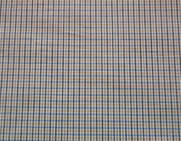 cotton fabric in a blue, white and beige checkered pattern