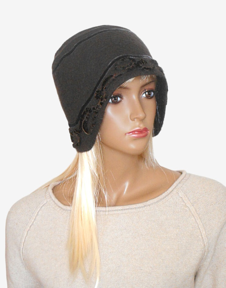 Three-quarter view of a dark brown felted merino wool winter hat