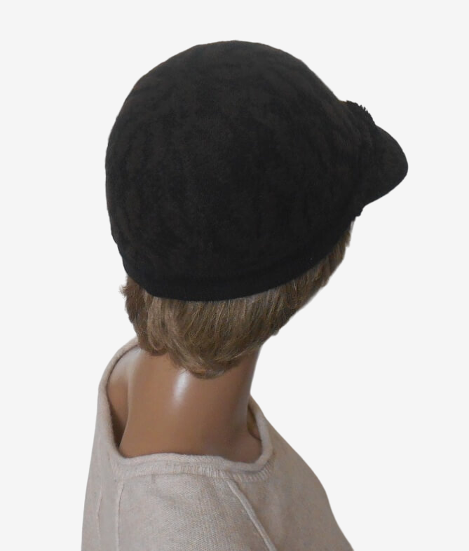 Dark brown wool baseball cap back view showing hand-felted merino wool and openwork details