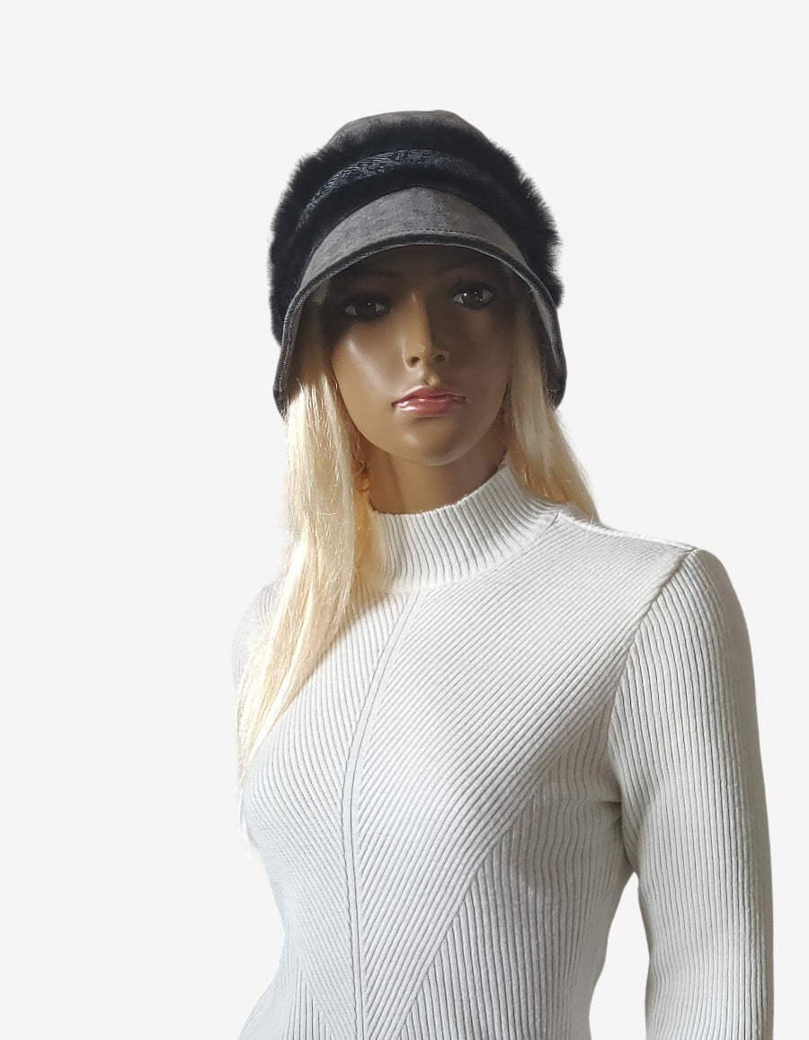 Front view of a dark grey velour women's hat with a narrow brim, decorated with a natural fur braid 