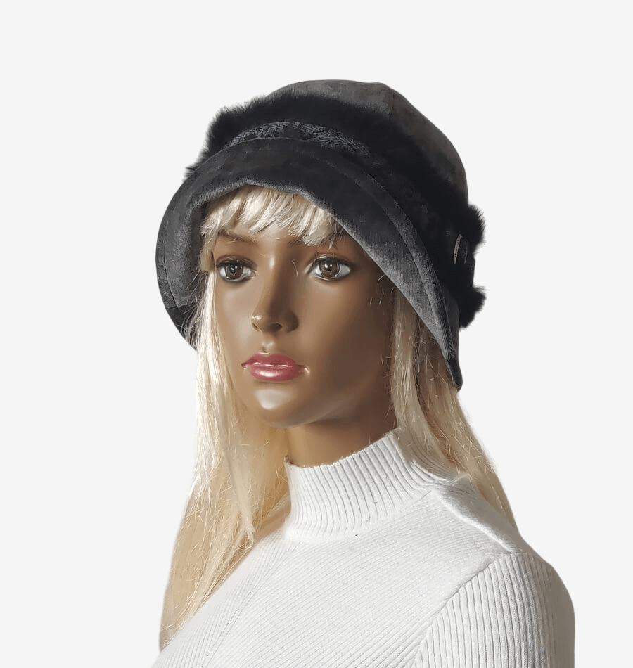 Angled view of an elegant dark gray women's hat with a small brim and natural fur braid, perfect for autumn and winter