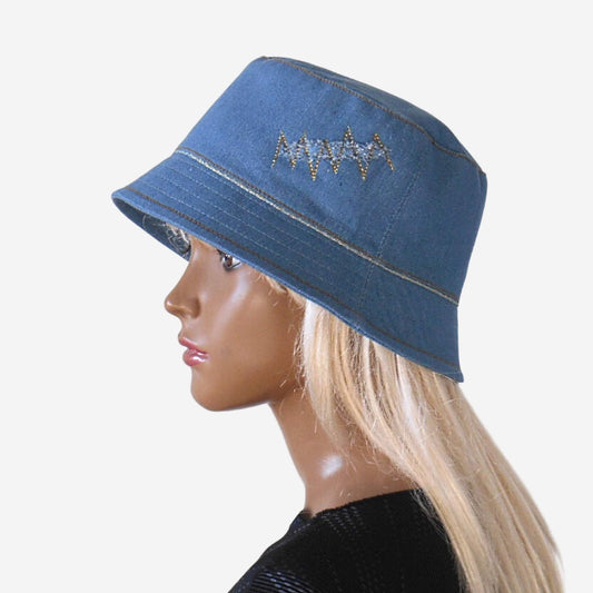 Women's denim bucket hat with decorative golden-colored braid.