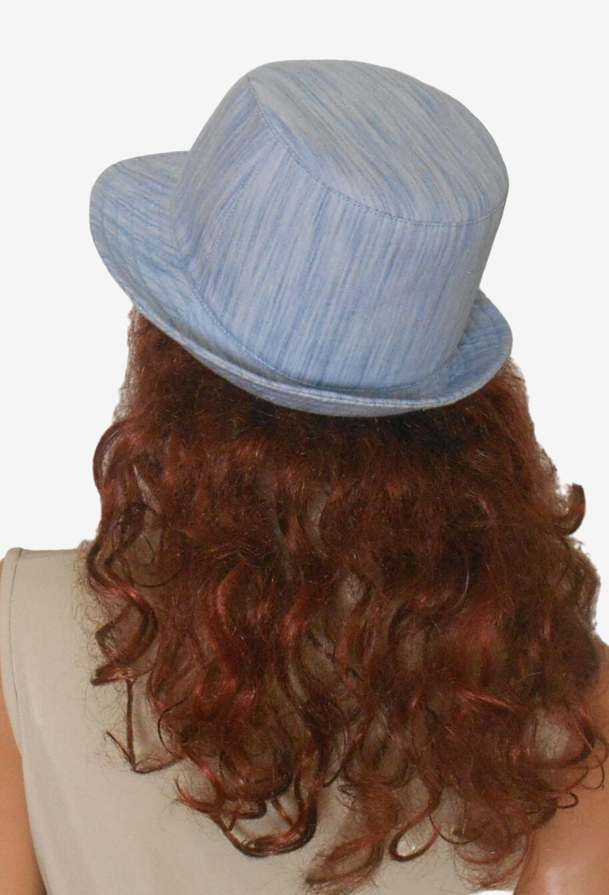 Back view of denim trilby hat in blue color
