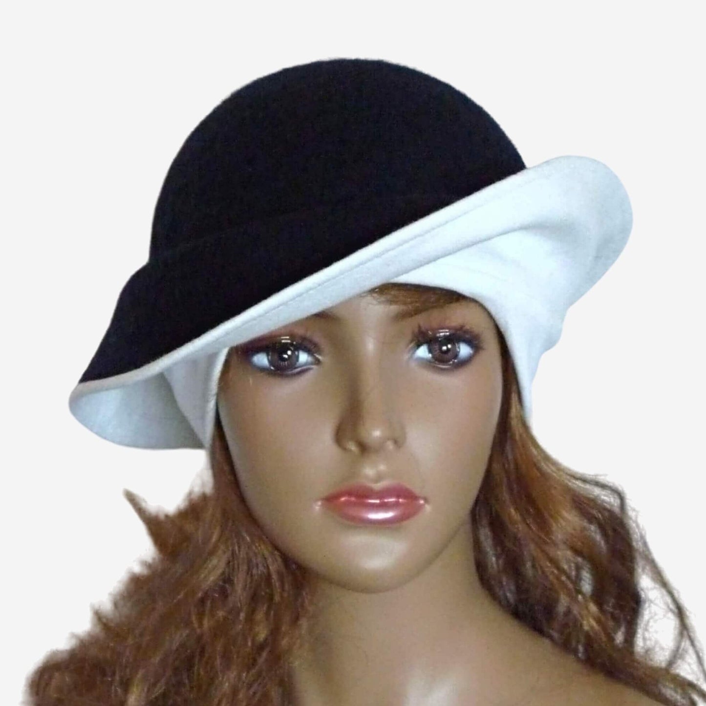 Front view of elegant black and white felt hat for women