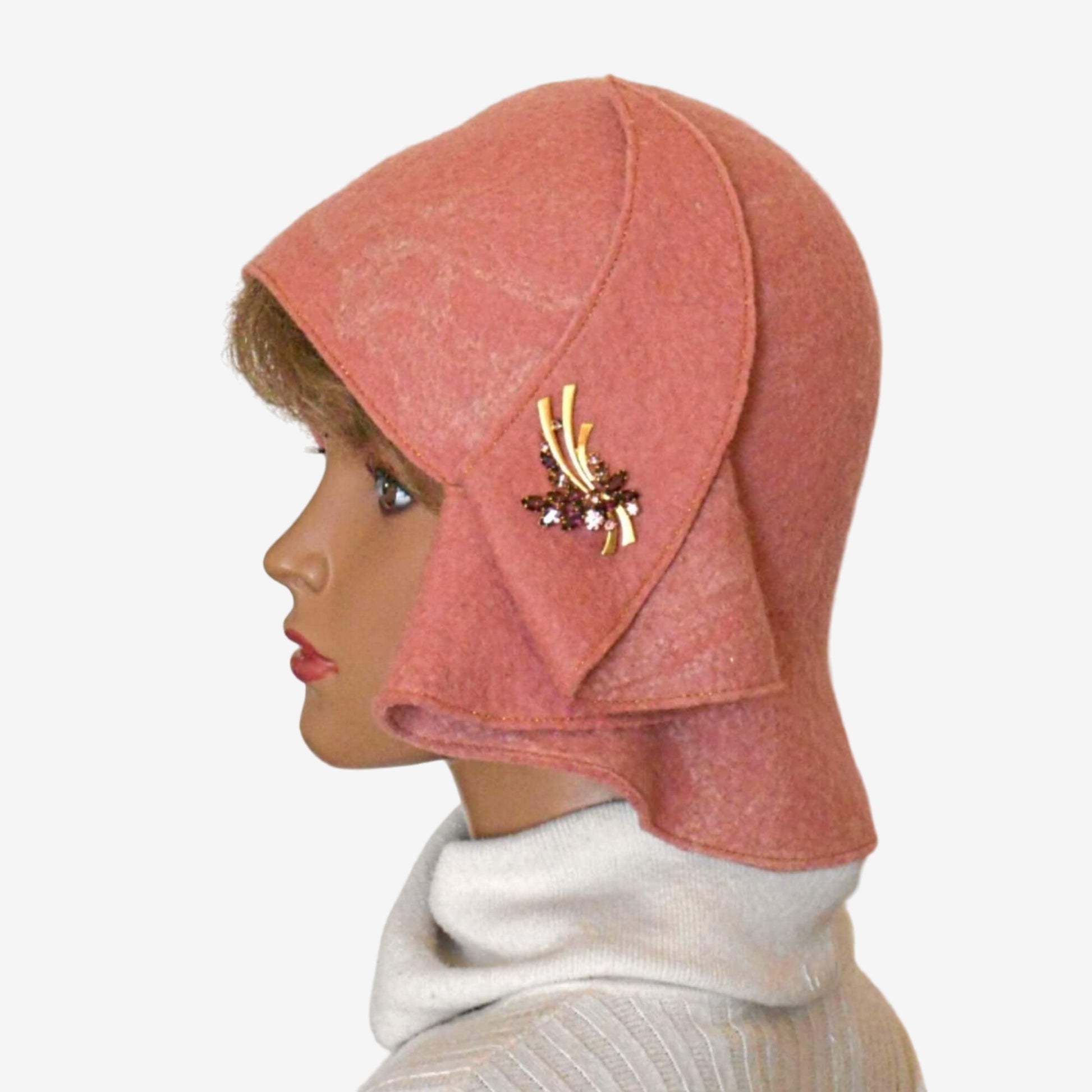 Felted pale pink hat with asymmetrical brim, stylish handmade women’s winter hat