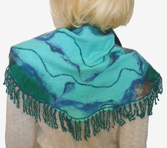 Back view of a nuno felted scarf in turquoise and green tones