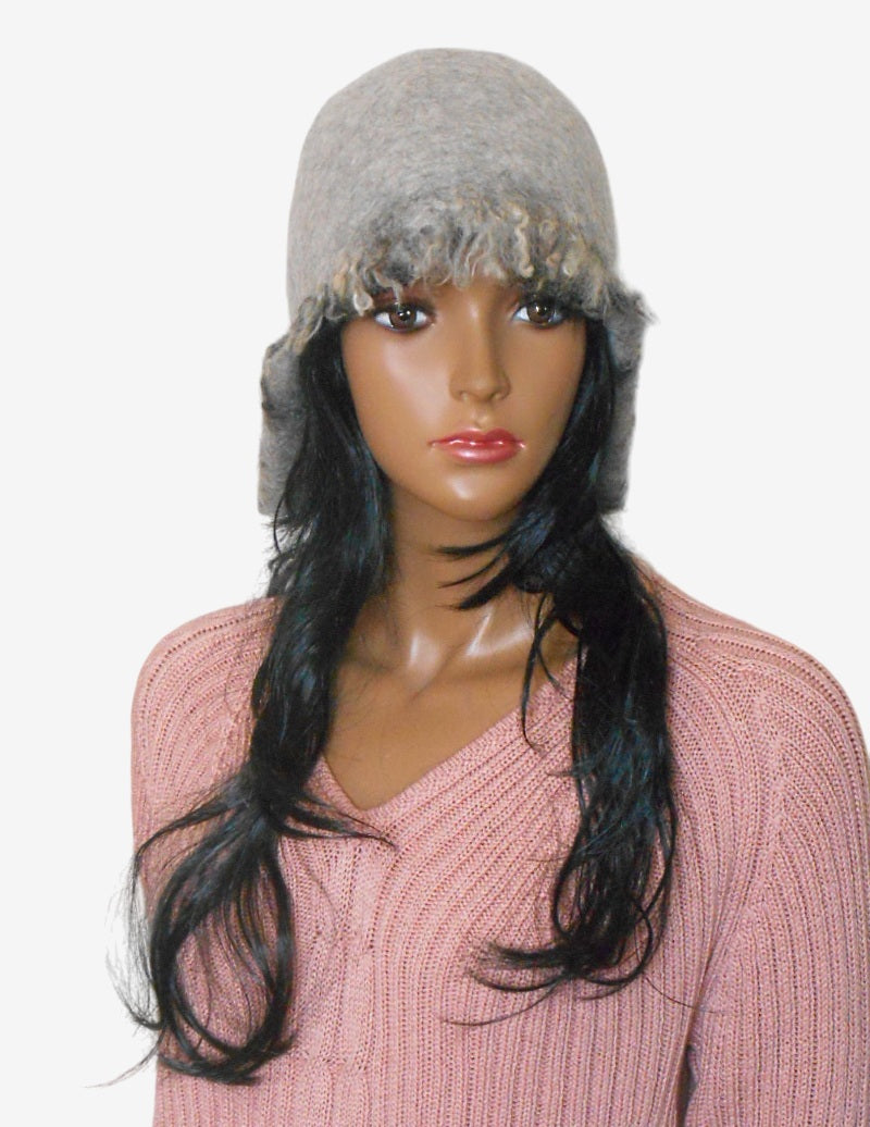 Front view of women’s gray felted wool ear flap hat, lightweight and cozy with lining
