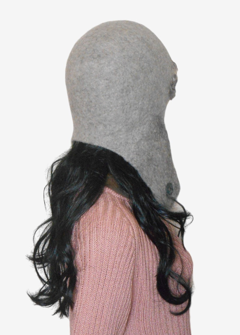Back view of women’s gray felted wool ear flap hat, lightweight and cozy