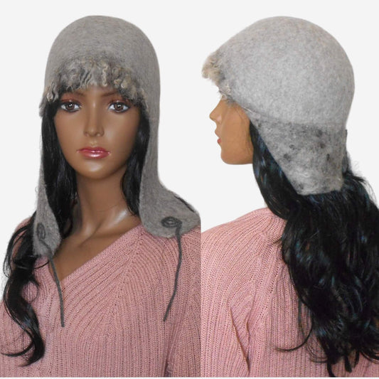 Women’s felted ear flap hat with decorative wool curls and warm lining