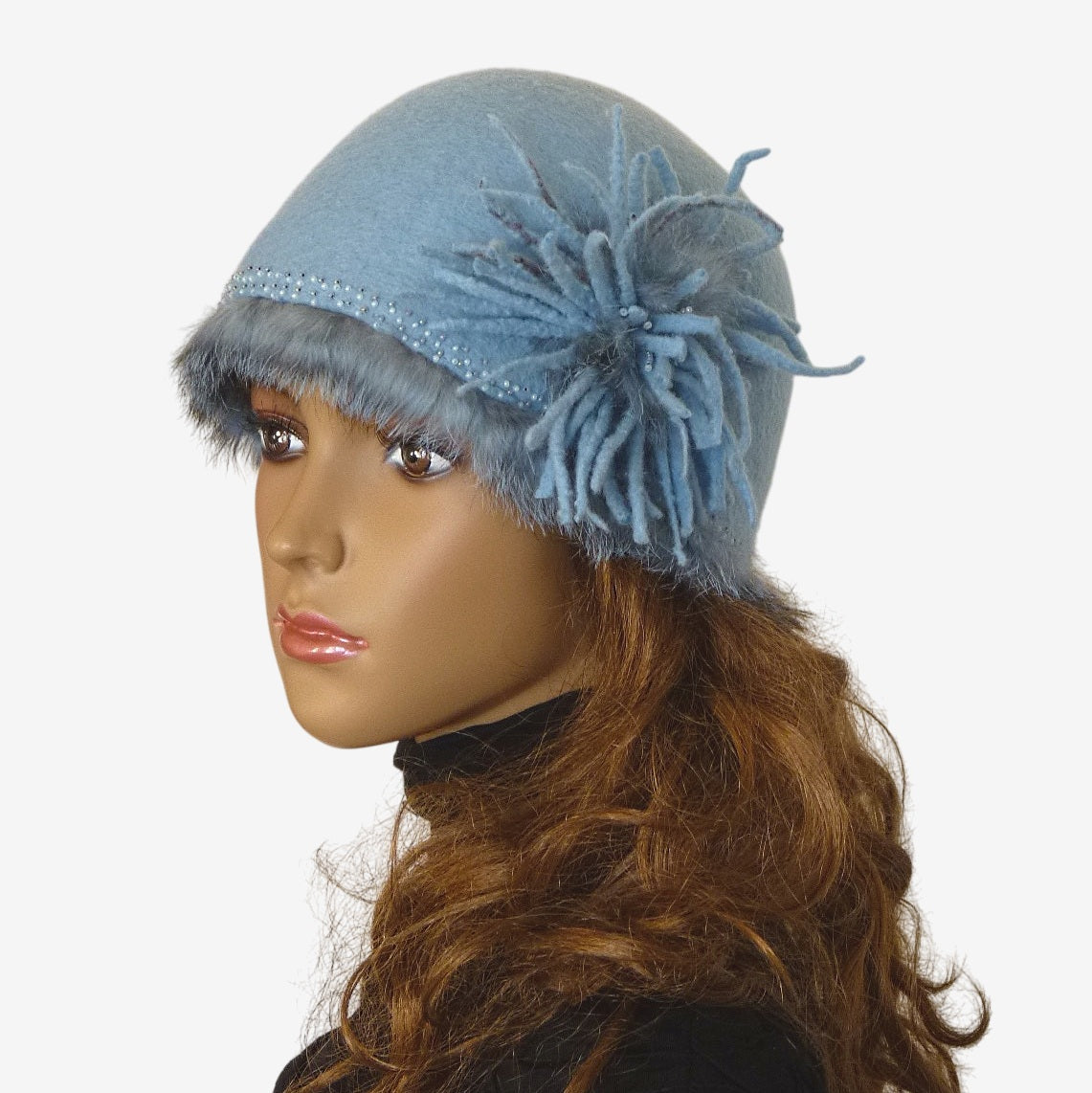 Side view of felted merino wool beanie with flower detail
