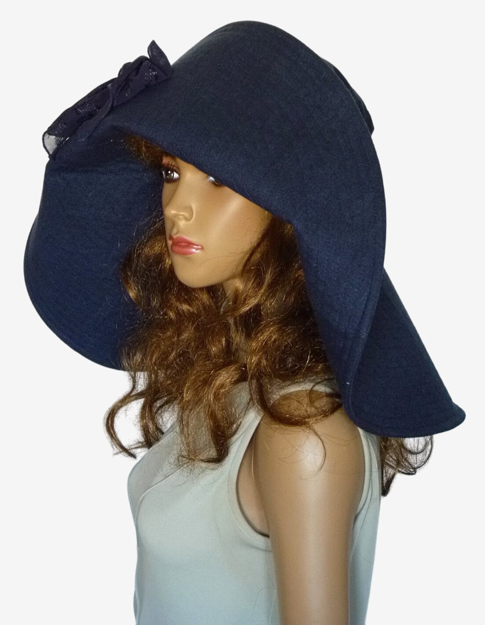 Three-quarter view of navy wide-brim linen beach hat for women
