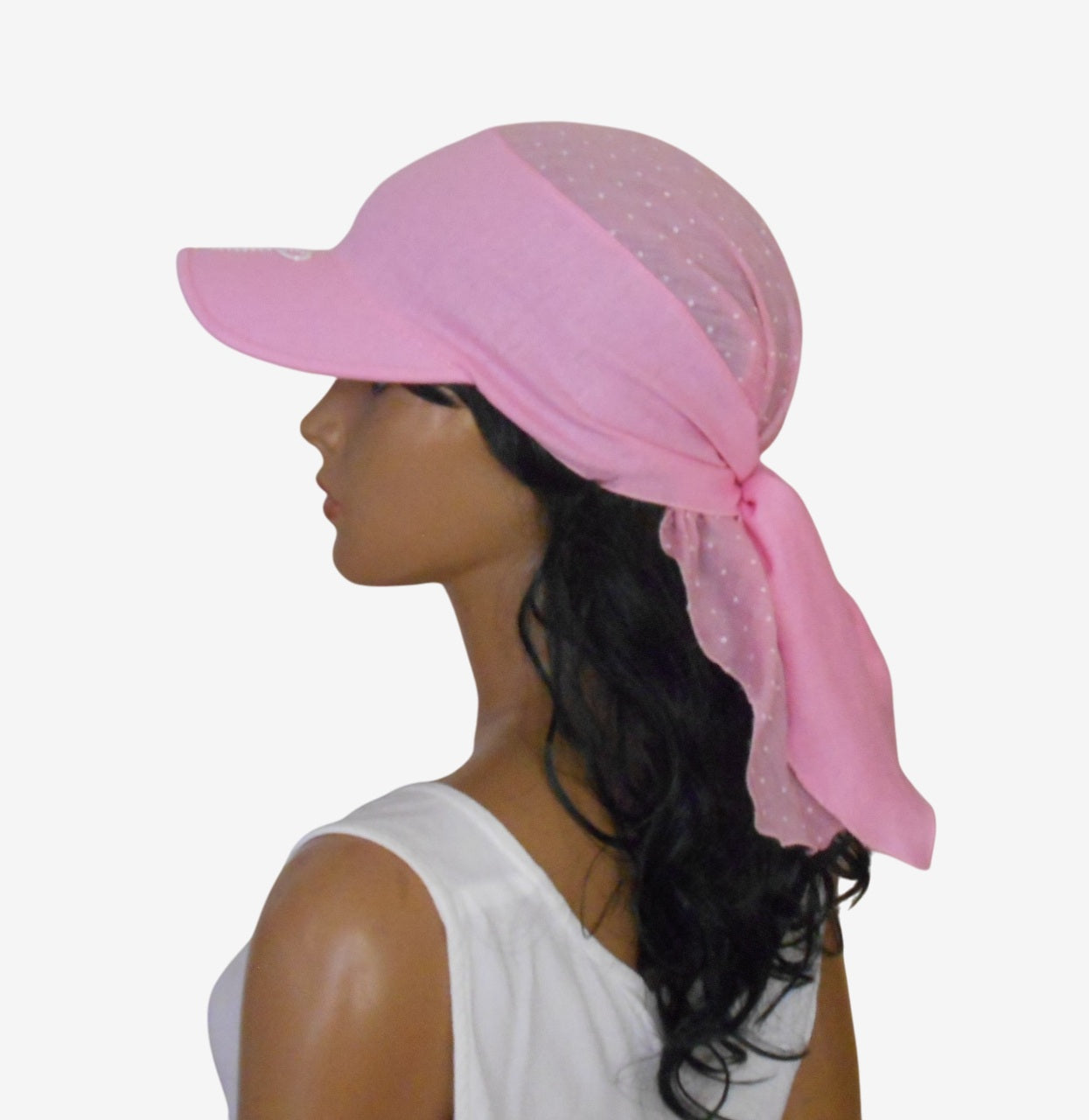 Side view of pink visor bandana with white polka dots for women — stylish summer accessory