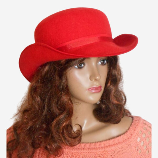 Red merino wool bowler hat, three-quarter view, handmade felted winter accessory