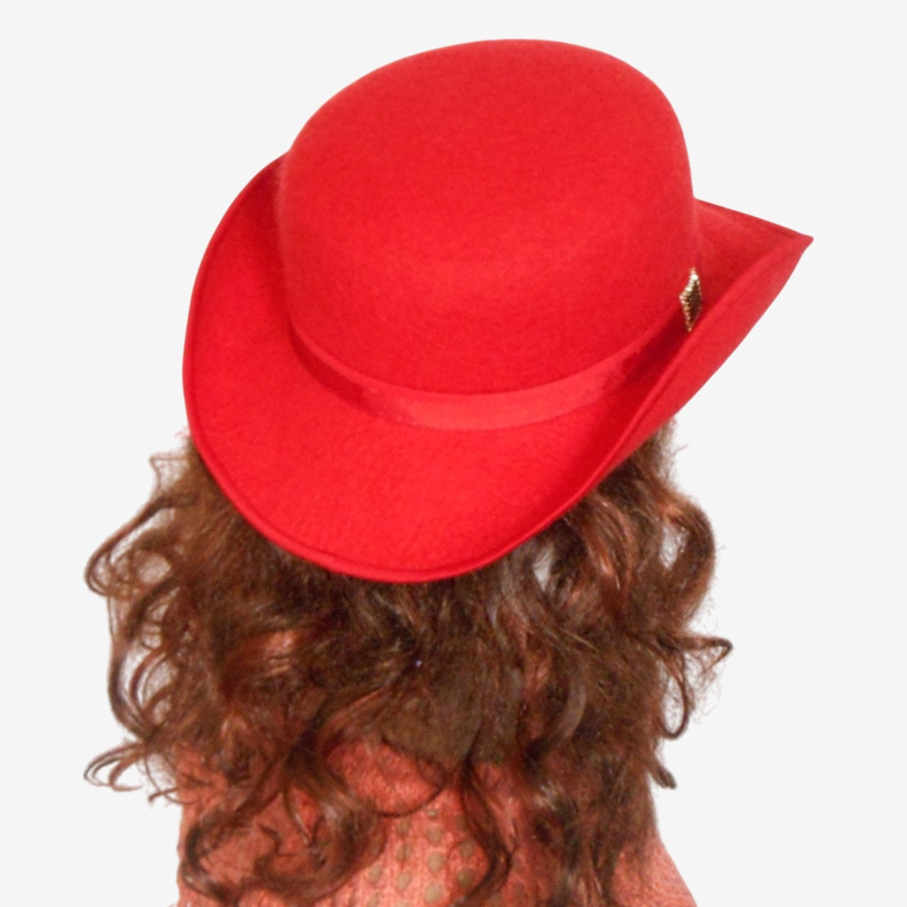 Back view of red felted bowler hat, handmade from merino wool