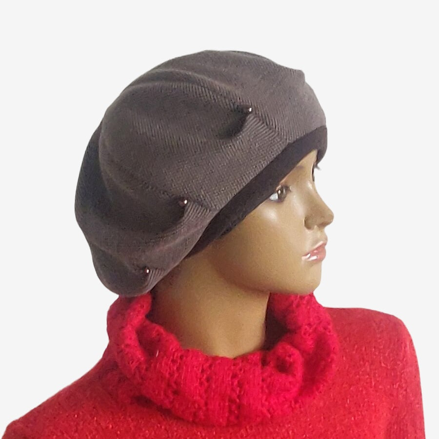 Side view of slouchy oversized brown beret showing relaxed fit