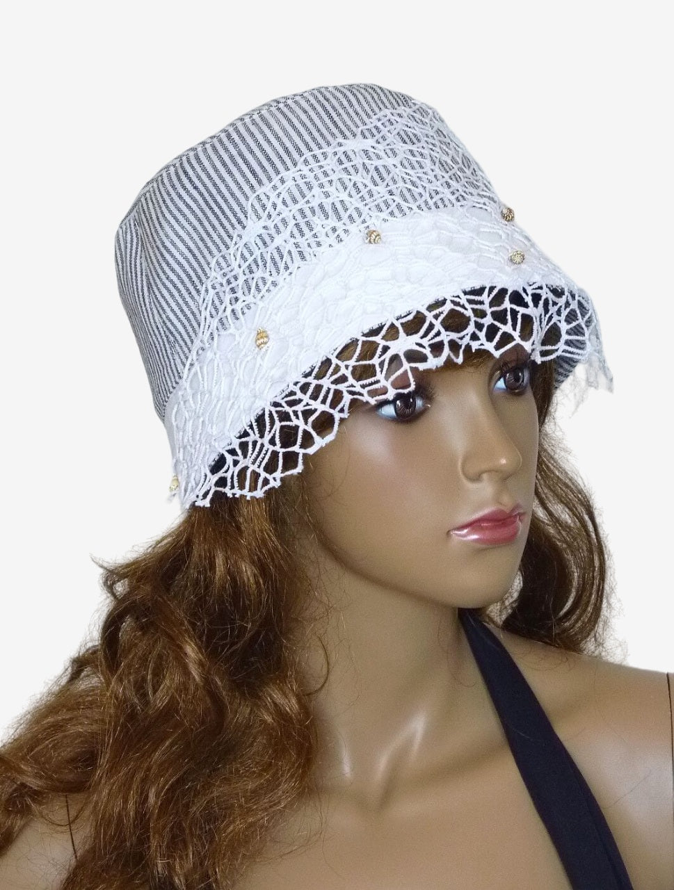Gray and white striped summer hat with veil and seashell decoration