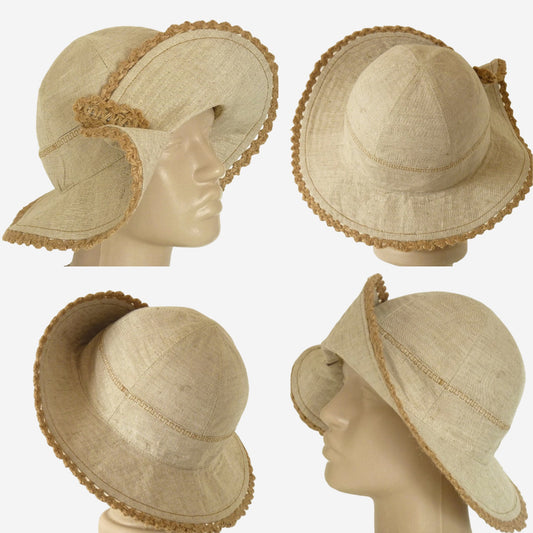 A beige linen summer hat with a small brim and handmade macramé cord decoration displayed on a mannequin head.