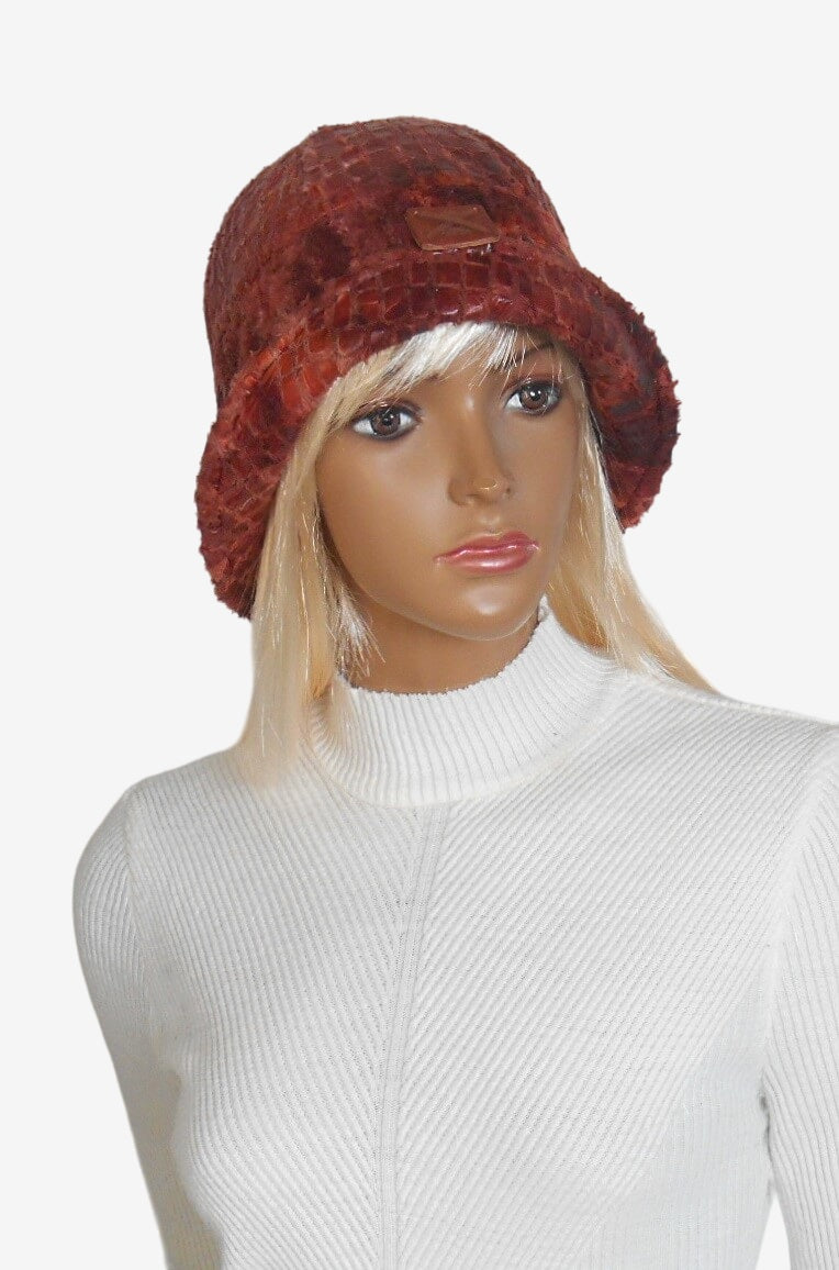 Three-quarter view of the terracotta cloche hat highlighting its elegant 1920s style