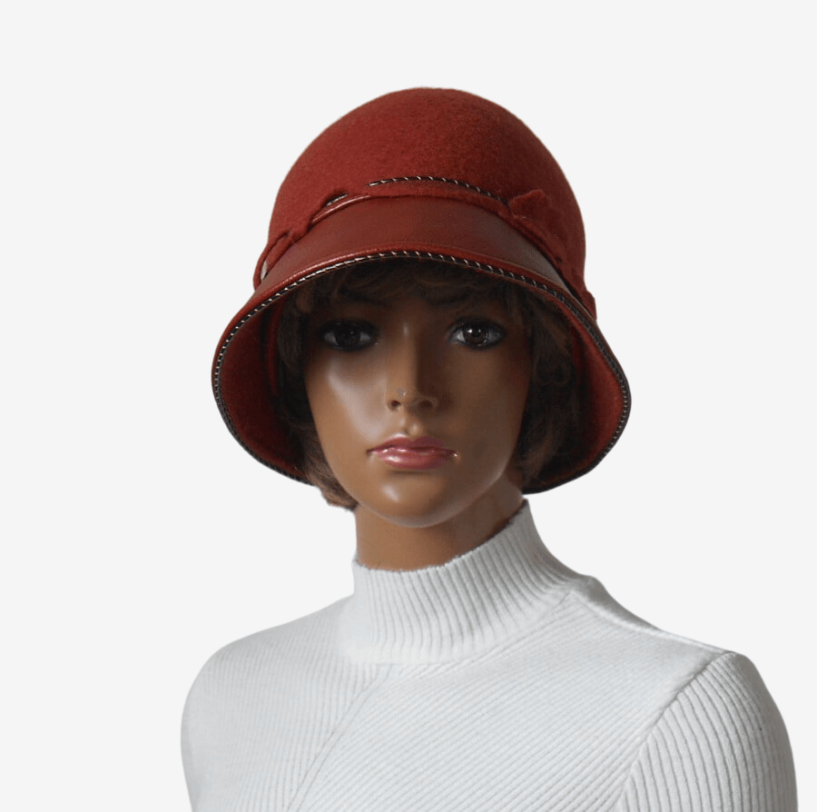 Front view of handmade terracotta felt and leather winter hat