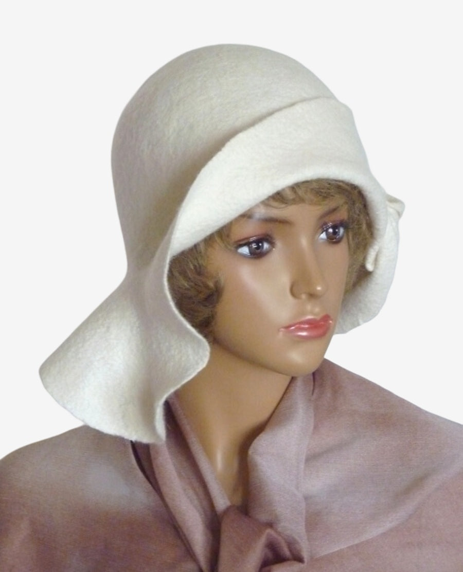 Three-quarter view showing the draped detail on one side of the white felt hat